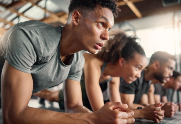 Cheetah health club members in a group training at the best gym in Andersonville